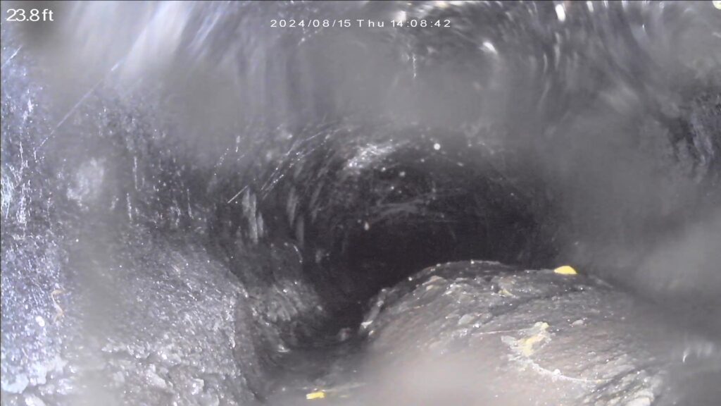 sewer scope image showing Orangeburg pipe deformation